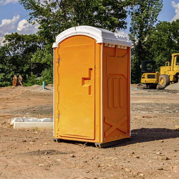 what is the cost difference between standard and deluxe portable restroom rentals in Warrick County